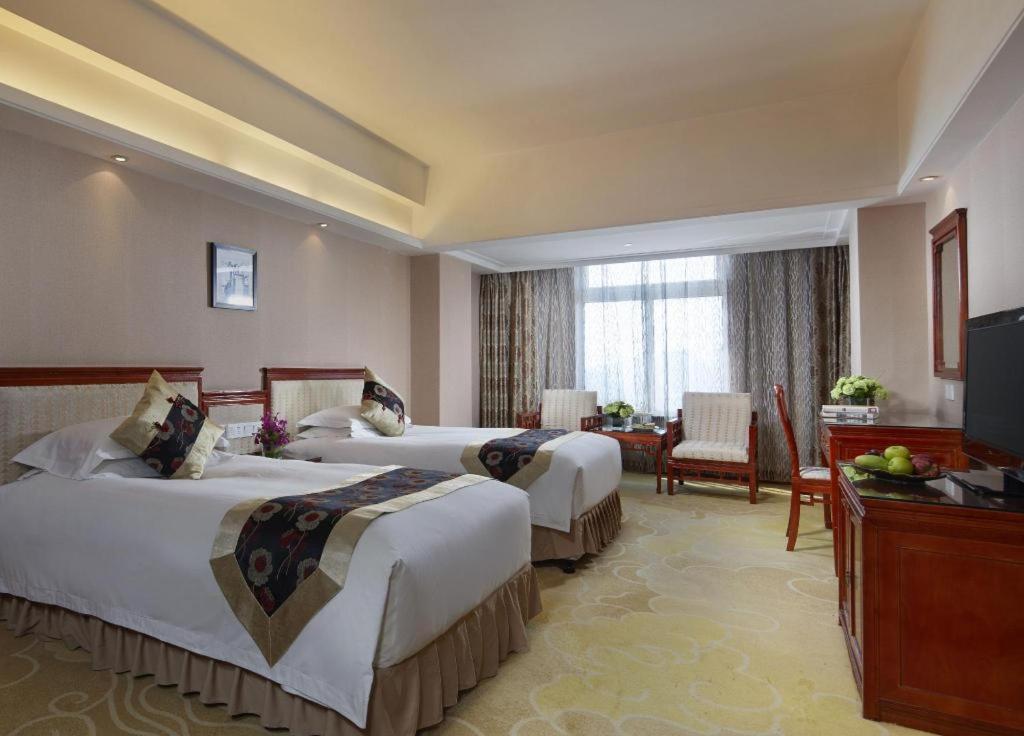 Feicheng Blossom Hotel Exterior photo